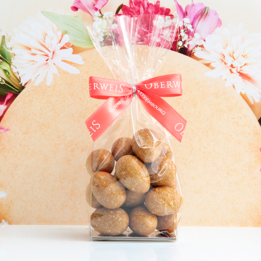 [002436*] Nougatine eggs filled with praline