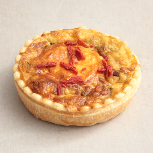 [011004*] Pie with goat cheese and honey 1 pers.
